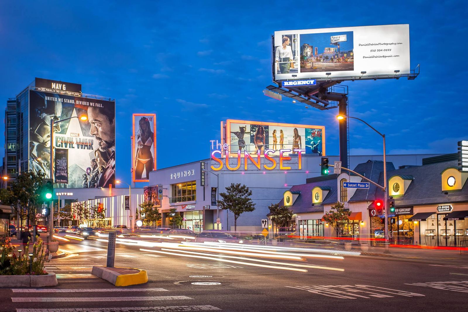 Sunset Strip street view at dusk with illuminated signage